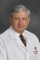 Photo of Dr. Sheynkin in white coat