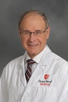 Dr. Robert Wasnick in a white coat