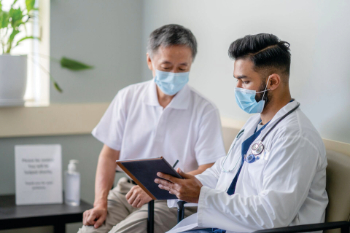 Doctor speaking to patient